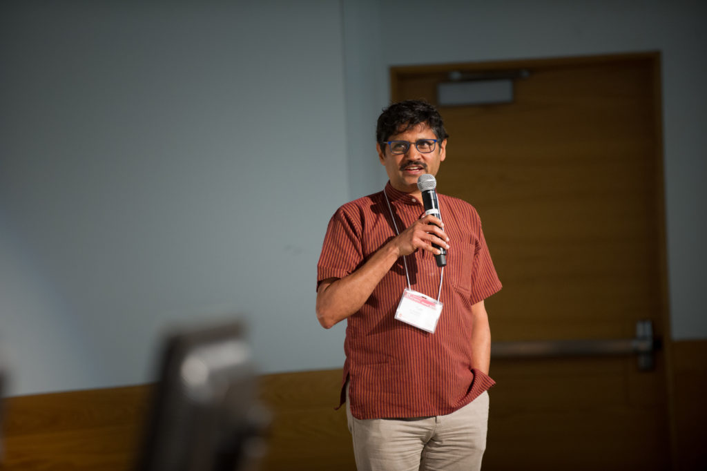 Giri V. presenting at the Annual Review.