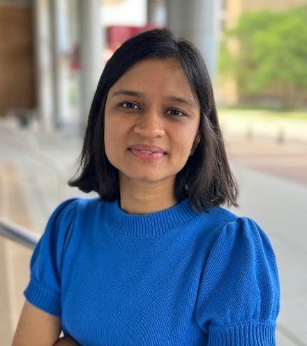 A portrait photo of Mahima in front of Engineering Hall.